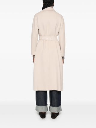 'S Max Mara Esturia coat. A fluid, unlined robe silhouette in pure virgin wool with a detachable belt. Italian elegance, available at our Lisbon store. 