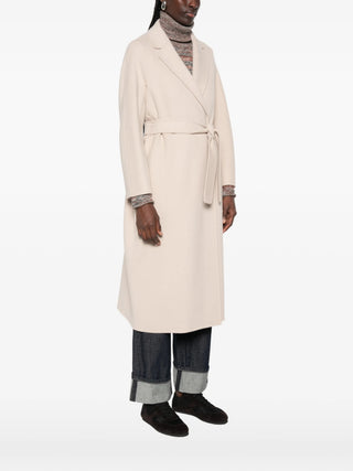 'S Max Mara Esturia coat. A fluid, unlined robe silhouette in pure virgin wool with a detachable belt. Italian elegance, available at our Lisbon store. 