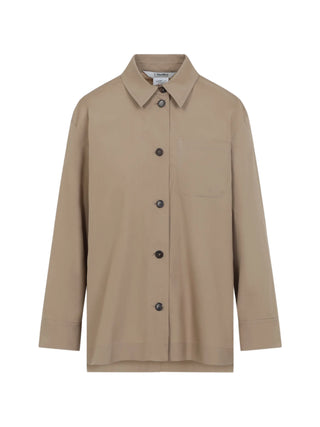 'S Max Mara Marianne cotton shirt. Pointed collar, chest pocket, horn buttons, and a modern asymmetrical hem with side slits. Available at our Lisbon store.