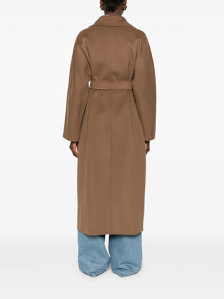 Penelope belted coat by 'S Max Mara. Notched lapels, long kimono sleeves, and welt pockets. A timeless investment, available at our Lisbon store. 
