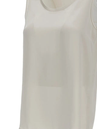'S Max Mara round-neck top. Minimalist design, premium materials, and impeccable Italian craftsmanship. A modern wardrobe staple, available at our Lisbon store.