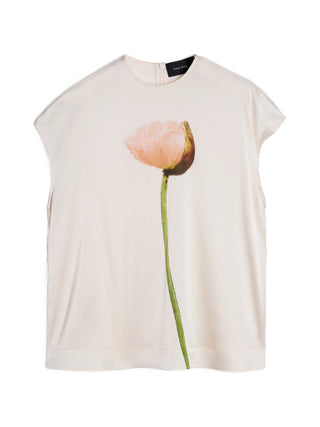 Simone Rocha beige sleeveless poppy motif smock top with zip fastening. Easy, romantic piece available at our Lisbon store.