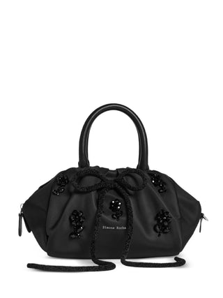 Simone Rocha black floral-appliqué tote with embroidered decorations, logo detail and zip fastening. Refined everyday bag available at our Lisbon store.
