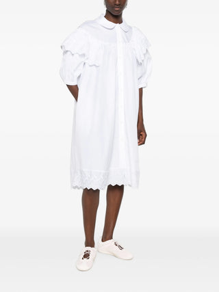 Simone Rocha white ruffle-trim midi shirt dress with broderie anglaise and puff sleeves. A feminine statement, available at our Lisbon store.