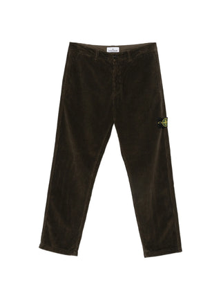 Compass-motif corduroy trousers from Stone Island. Premium cotton with a straight-leg silhouette, belt loops, and a button-zip fly. Iconic side patch. 