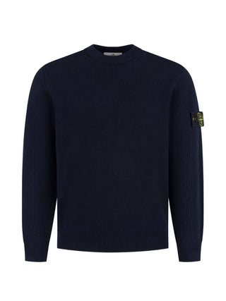Compass-patch ribbed-knit sweater from Stone Island. Relaxed fit, crew neck, and premium fabric. Effortless style. Available at our Lisbon store.