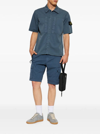 Stone Island short-sleeved shirt with signature Compass patch. Crafted from soft cotton jersey with a classic crew neck. Available at our Lisbon store. 
