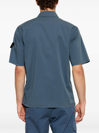 Stone Island short-sleeved shirt with signature Compass patch. Crafted from soft cotton jersey with a classic crew neck. Available at our Lisbon store. 