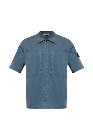 Stone Island short-sleeved shirt with signature Compass patch. Crafted from soft cotton jersey with a classic crew neck. Available at our Lisbon store. 