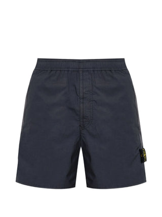 Logo-patch shorts from Stone Island. Crafted from premium cotton or nylon with elasticated or button waist. Iconic side badge. Available at our Lisbon store.