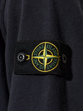 Stone Island logo-patch sweater. Iconic Compass badge, premium knit, and effortless style. An everyday icon. Available at our Lisbon store.