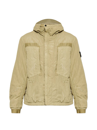 Stone Island hooded jacket with signature Compass patch. Functional hood, zip fastening, and technical fabric. Available at our Lisbon store. 