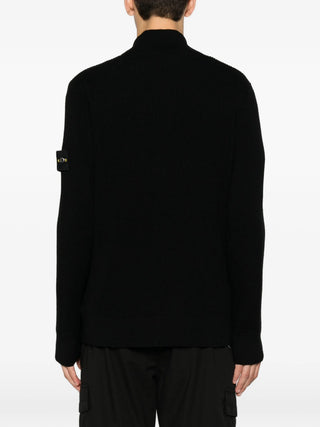 Stone Island ribbed-knit sweater. Signature detachable Compass patch and premium virgin wool. A modern classic that is also available at our Lisbon store. 