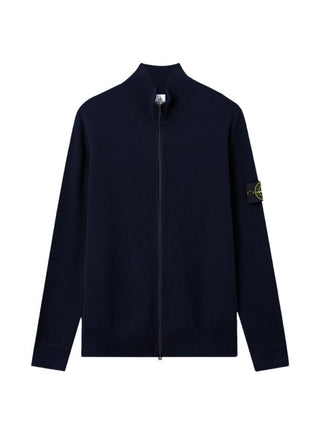 Ribbed cardigan with a high stand collar and zip fastening. Crafted from wool or cotton with the signature Stone Island badge on the sleeve. 