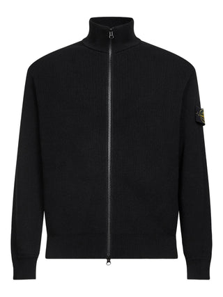 Stone Island's ribbed cardigan. Defined by its collar, premium fabric, and detachable Compass motif. Functional style redefined. Available at our Lisbon store.