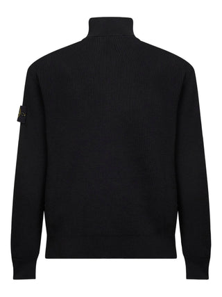 Stone Island's ribbed cardigan. Defined by its collar, premium fabric, and detachable Compass motif. Functional style redefined. Available at our Lisbon store.