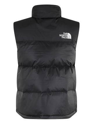 The North Face 1996 Retro Nuptse gilet. Iconic streetwear staple with 700-fill down, oversized baffles, and recycled ripstop. Packable and water-repellent.