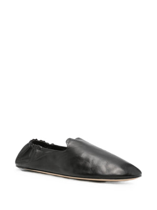Slip-on shoe in soft calfskin leather with round toe, elasticated heel, and flexible leather sole. Pure luxurious comfort. Available at our Lisbon store.