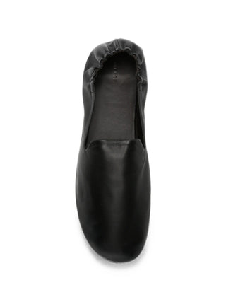 Slip-on shoe in soft calfskin leather with round toe, elasticated heel, and flexible leather sole. Pure luxurious comfort. Available at our Lisbon store.