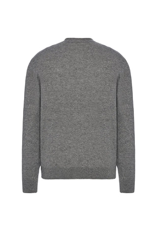 Dyce cardigan by THE ROW. Pure cashmere, button front, and a relaxed silhouette. Impeccable materials for an effortless, elevated staple. 