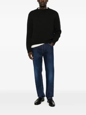 THE ROW Markhim sweater. Italian-made cashmere knit with a ribbed texture and a modern melange finish.  Available at our Lisbon store.