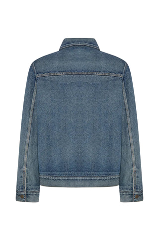 The Row Mendo denim jacket. Structured cotton, paneled yoke, brushed cotton flannel lining. Available at our Lisbon store.
