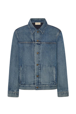 The Row Mendo denim jacket. Structured cotton, paneled yoke, brushed cotton flannel lining. Available at our Lisbon store.