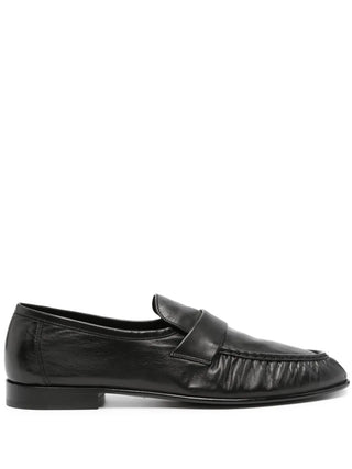 The Row Soft Loafer in paneled lambskin leather. Features artisanal pleating and a hand-painted leather sole. Available at our Lisbon store.