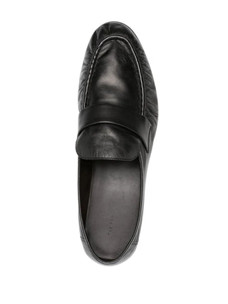The Row Soft Loafer in paneled lambskin leather. Features artisanal pleating and a hand-painted leather sole. Available at our Lisbon store.