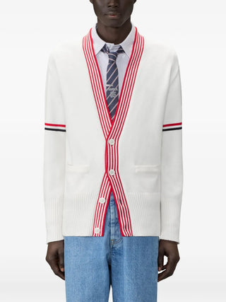 THOM BROWNE lobster jersey stitch V-neck cardigan. Signature lobster intarsia at back, 4-Bar detail, and cotton jersey stitch. Available at our Lisbon store. 