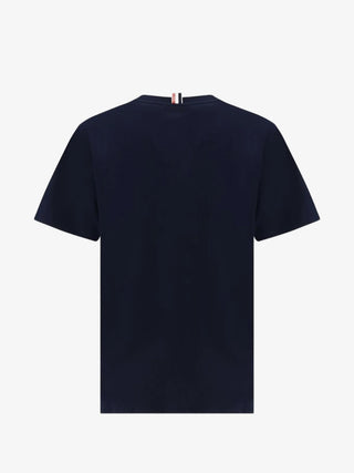 Thom Browne relaxed fit T-shirt. Signature details, premium cotton, and Italian craftsmanship. An iconic everyday staple, available at our Lisbon store.