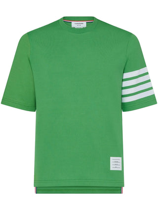 Thom Browne 4-Bar T-shirt. Crafted in pure cotton. Defined by the signature 4-Bar motif and a refined, sporty aesthetic. Available at our Lisbon store. 