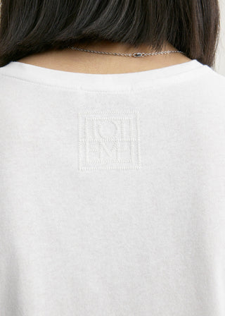This classic T-shirt features a tonal embroidered monogram at the nape, crew neck, short sleeves and is made from soft organic-cotton jersey. 