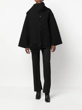 TOTEME embroidered jacket in a wool blend with a scarf and tonal stitching. A boxy silhouette with drop shoulders, patch pockets, and a front button closure.