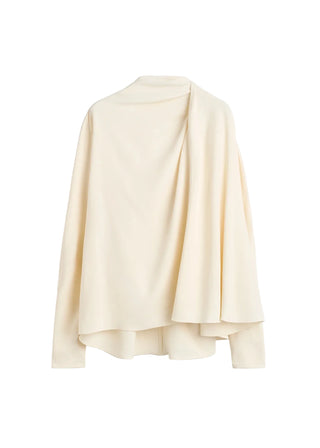 Blouse crafted from fluid viscose cady with elongated sleeves. Juxtapose the draped silhouette with denim, heels and a clutch. Available at our Lisbon store. 