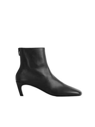TOTEME nappa mid-heel boots. Soft leather, sock-like fit, and a refined kitten heel. Effortless  elegance, available at our Lisbon store. 