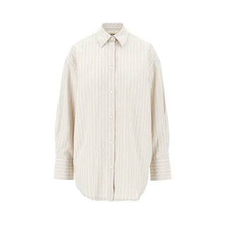 The oversized striped shirt from TOTEME. Boxy silhouette, soft fabric, and endless styling possibilities for any season. Available at our Lisbon store. 