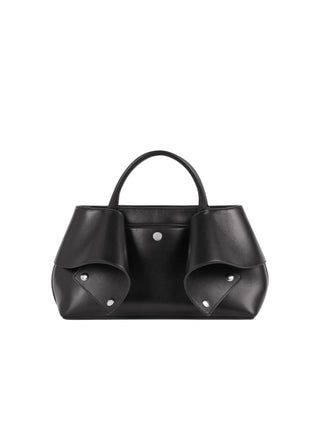 Small Mercer tote by TOTEME. Smooth leather, belt detailing, sunken zip closure, and red interior. Available at our Lisbon store. 