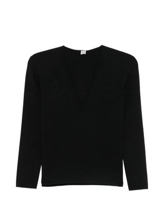Crafted from fine yarns, this V-neck sweater offers a relaxed fit and soft handfeel. Minimalist luxury at its best.