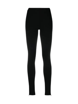 Toteme Zip Leggings in dense viscose-blend jersey. A second-skin silhouette with a high elastic waist and signature zip cuffs. Available at our Lisbon store. 
