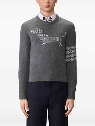 Thom Browne grey wool sweater with 4-Bar stripe and dog motif. Smart fit with buttoned cuffs. Available at our Lisbon store.