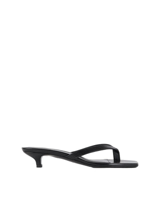 Black leather heeled flip flop sandals by Toteme