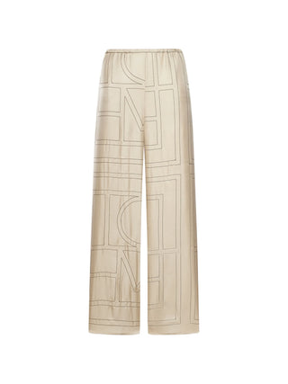 Beige pants with geometric pattern by Toteme