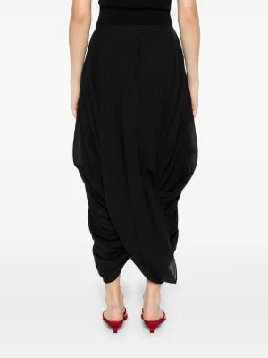 TOTEME's Cocoon Skirt. Structured volume, clean lines, and a signature curved hem. Modern elegance redefined for the discerning minimalist.