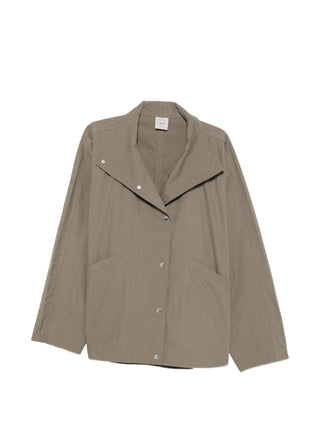 Lightweight summer jacket with a relaxed parachute silhouette. Breathable fabric and effortless styling from TOTEME. Available at our Lisbon store. 