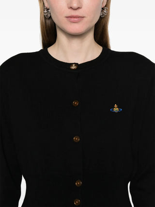 Bea Cropped Cardi in a soft organic cotton-cashmere blend. Features a round neckline, ribbed trims, and an Orb-engraved button. Available at our Lisbon store. 