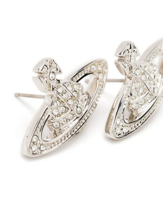 Vivienne Westwood Mini Bas Relief earrings. The iconic orb design with intricate cut-out detailing and crystal accents. Available at our Lisbon store.