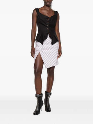 Monday vest with a long-line silhouette, fitted waist, and wide shoulder straps. Features a front button placket and small embroidered Orb logo. 