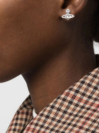 Vivienne Westwood Narcissa studs. Iconic Orb design in platinum-plated silver with cubic zirconia detailing. Available at our Lisbon store.