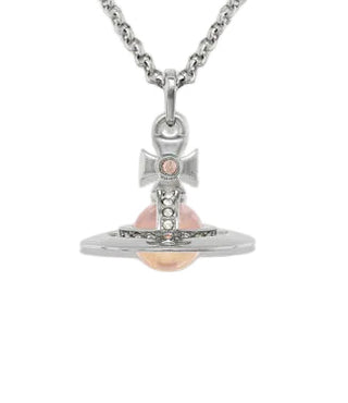 Vivienne Westwood New Tiny Orb Pendant. Iconic three-dimensional orb with crystal embellishments in brass. A signature piece reflecting the house's heritage.